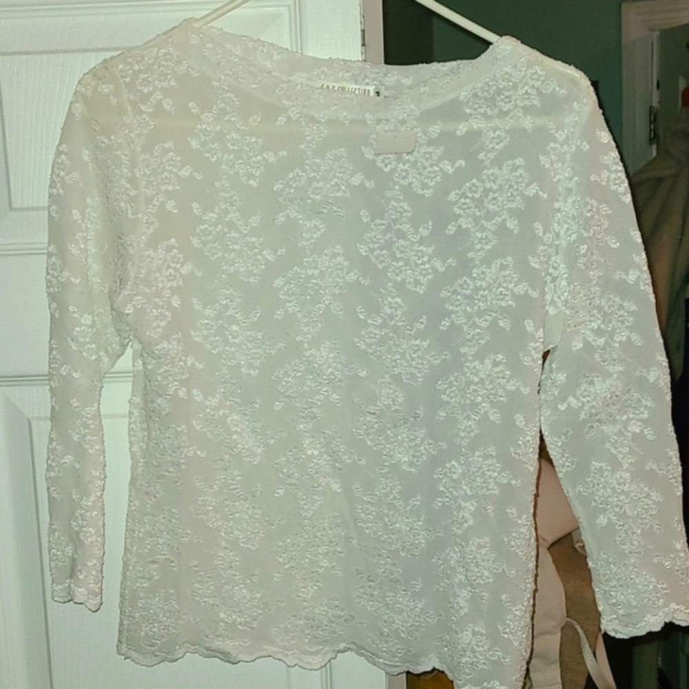 Lace blouse, dressy, boat neck, long sleeves, semi sheer, size  medium.